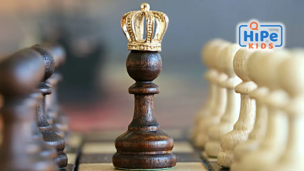 Un pion noir aux échecs surmonté d'une couronne